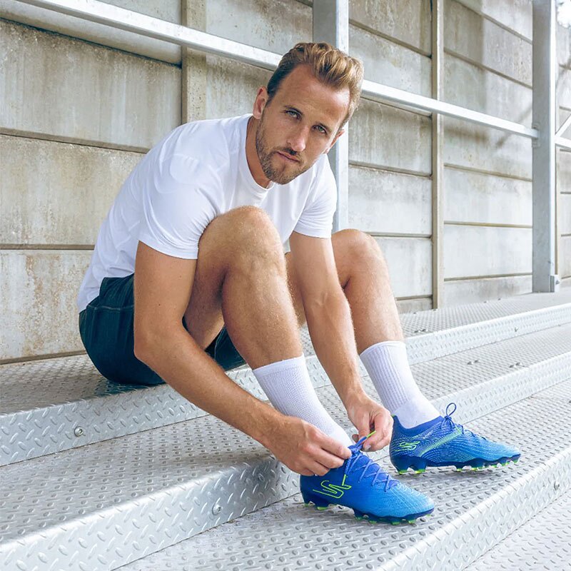 Black Skechers football boots, elite player model